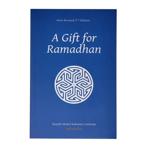 Blue book titled 'A Gift for Ramadhan' with a white geometric design on a white background