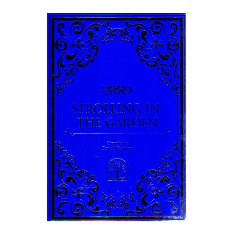 Blue book cover with decorative patterns and 'Strolling in the Garden' text on a white background